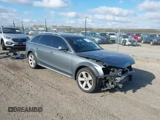 2014 Audi allroad A4 Premium Plus z VIN WA1UFAFL8EA133365, wystawiony jako IAAI lot #42034903 z przebiegiem 145 285 mil mil oraz . Historia ofert i sprzedaży dostępna na DreamBid. Obrazek 1.