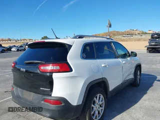 2016 Jeep Cherokee Latitude with VIN 1C4PJLCB9GW149217, listed as a IAAI auction lot 41365164 with 144,702 mi miles. Bid and sale history available at carsss.com. Image 4.
