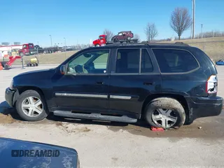 2004 GMC Envoy SLE z VIN 1GKDT13SX42416096, wystawiony jako IAAI lot #41695510 z przebiegiem 240 658 mil mil oraz . Historia ofert i sprzedaży dostępna na DreamBid. Obrazek 14.