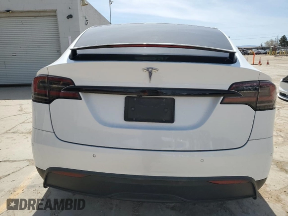 2022 Tesla Model X with VIN 7SAXCBE52NF362994, listed as a Copart auction lot 49850475 with 55,506 mi miles and Salvage Title. Bid and sale history available at DreamBid. Image 6.