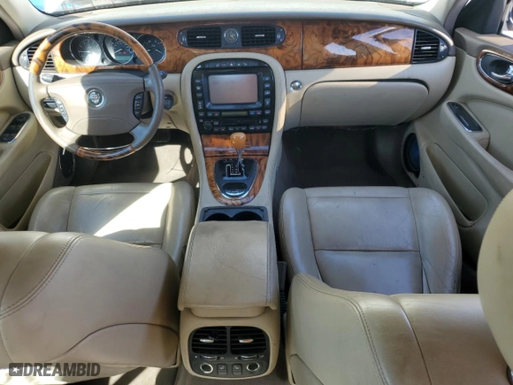 2005 Jaguar XJ with VIN SAJWA79C35SG48607, listed as a Copart auction lot 77132444 with 159,051 mi miles and Salvage Title. Bid and sale history available at carsss.com. Image 8.