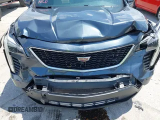 2019 Cadillac XT4 FWD Sport with VIN 1GYFZER42KF107032, listed as a IAAI auction lot 42193557 with 96,615 mi miles and . Bid and sale history available at DreamBid. Image 6.