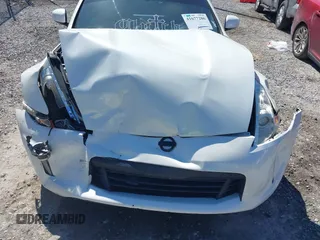 2015 Nissan 370Z Sport with VIN JN1AZ4EH9FM443719, listed as a IAAI auction lot 41677286 with 87,967 mi miles and . Bid and sale history available at DreamBid. Image 12.