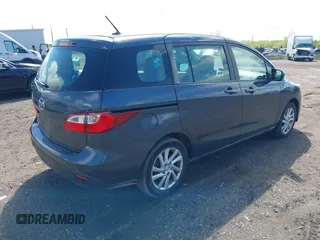 2012 Mazda 5 Sport with VIN JM1CW2BL4C0107491, listed as a IAAI auction lot 42191489 with 108,411 mi miles and . Bid and sale history available at DreamBid. Image 4.