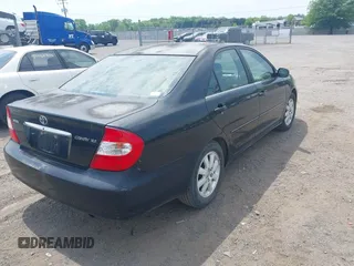 2003 Toyota Camry LE with VIN 4T1BE30K33U243758, listed as a IAAI auction lot 42169032 with 260,336 mi miles and . Bid and sale history available at DreamBid. Image 4.