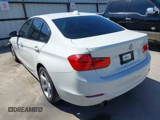 2015 BMW 3 Series 320i with VIN WBA3B1C53FK138341, listed as a IAAI auction lot 41757490 with 125,280 mi miles. Bid and sale history available at carsss.com. Image 3.