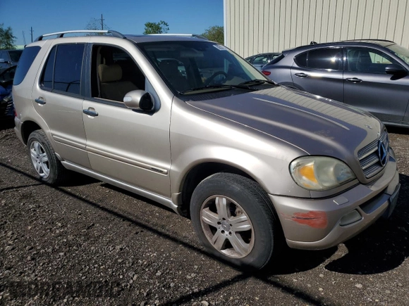 2005 Mercedes-Benz M 500 with VIN 4JGAB75E85A529110, listed as a Copart auction lot 80557034 with 130,560 mi miles and Salvage title. Bid and sale history available at DreamBid. Image 4.
