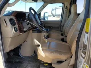 2016 Ford Econoline Commercial with VIN 1FDXE4FS7GDC01103, listed as a Copart auction lot 69039204 with 9,986 mi miles and Salvage Title. Bid and sale history available at carsss.com. Image 7.