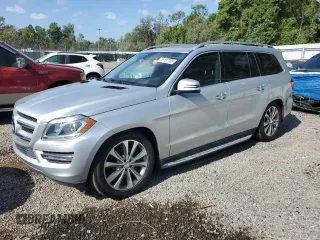 2014 Mercedes-Benz GL 450 z VIN 4JGDF7CEXEA348496, wystawiony jako Copart lot #55187005 z przebiegiem 150 359 mil mil oraz Tytuł czysty. Historia ofert i sprzedaży dostępna na DreamBid. Obrazek 1.