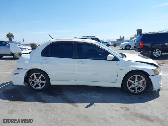 2005 Mitsubishi Lancer Evolution VIII with VIN JA3AH86DX5U054278, listed as a IAAI auction lot 41881180 with 157,497 mi miles. Bid and sale history available at carsss.com. Image 13.