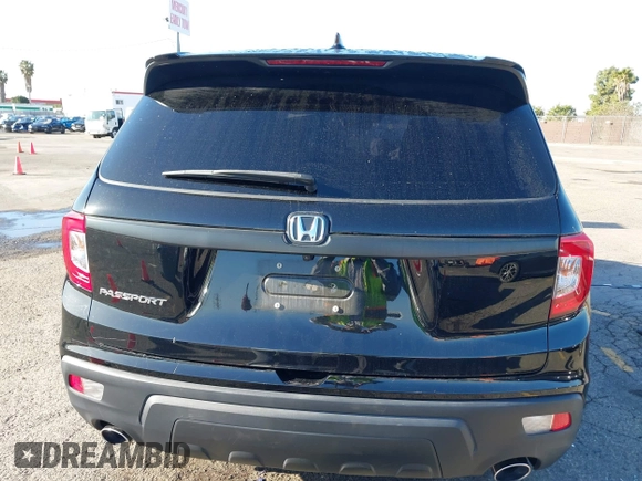 2021 Honda Passport EX-L with VIN 5FNYF7H56MB012736, listed as a IAAI auction lot 41820979 with 47,663 mi miles. Bid and sale history available at carsss.com. Image 16.