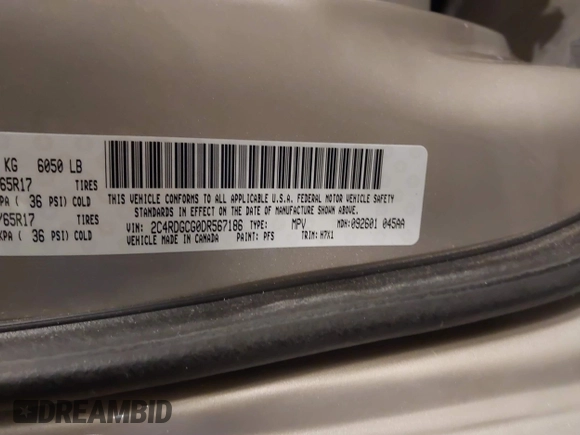 2013 Dodge Grand Caravan SXT with VIN 2C4RDGCG0DR567186, listed as a IAAI auction lot 41706119 with 112,512 mi miles and . Bid and sale history available at DreamBid. Image 9.
