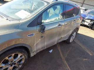 2014 Ford Escape Titanium with VIN 1FMCU9J96EUA15990, listed as a IAAI auction lot 41667046 with 203,202 mi miles. Bid and sale history available at carsss.com. Image 6.