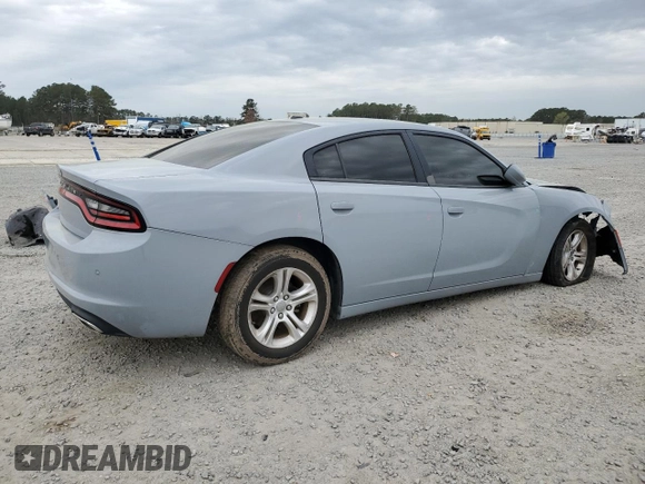 2021 Dodge Charger SXT with VIN 2C3CDXBG7MH522506, listed as a Copart auction lot 50197255 with 97,090 mi miles and Salvage Title. Bid and sale history available at DreamBid. Image 3.