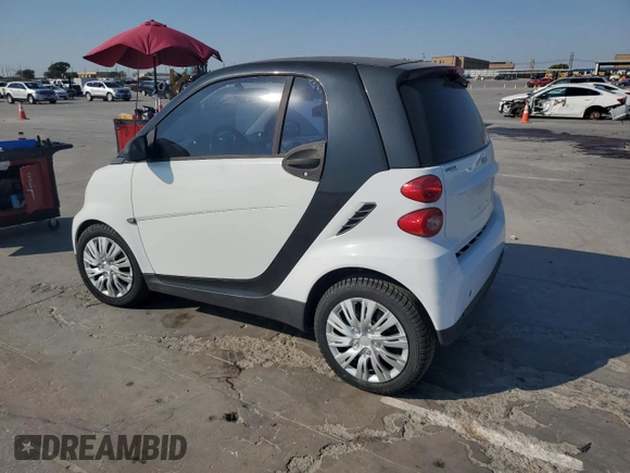 2012 Smart fortwo Pure z VIN WMEEJ3BA5CK540092, wystawiony jako Copart lot #75701964 z przebiegiem 59 355 mil mil oraz Szkody całkowita. Historia ofert i sprzedaży dostępna na DreamBid. Obrazek 2.