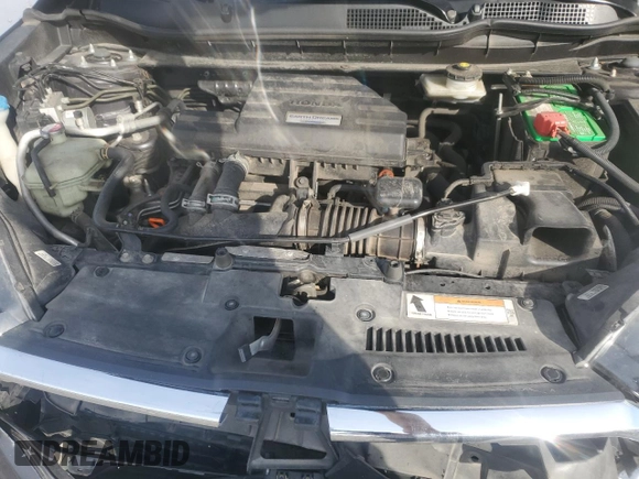 2018 Honda CR-V Touring z VIN 7FARW2H94JE077885, wystawiony jako Copart lot #55451345 z przebiegiem 133 964 mil mil oraz Szkoda całkowita • Salvage title. Historia ofert i sprzedaży dostępna na DreamBid. Obrazek 11.