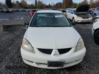 2005 Mitsubishi Lancer ES with VIN JA3AJ26E55U036958, listed as a Copart auction lot 79773814 with 215,965 mi miles and Salvage Title. Bid and sale history available at carsss.com. Image 5.