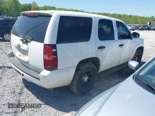 2010 Chevrolet Tahoe LS with VIN 1GNMCAE05AR263340, listed as a IAAI auction lot 41998453 with 256,944 mi miles and . Bid and sale history available at DreamBid. Image 4.