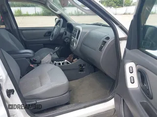 2006 Ford Escape XLT z VIN 1FMCU03106KA68555, wystawiony jako IAAI lot #42639823 z przebiegiem 147 320 mil mil oraz . Historia ofert i sprzedaży dostępna na DreamBid. Obrazek 5.