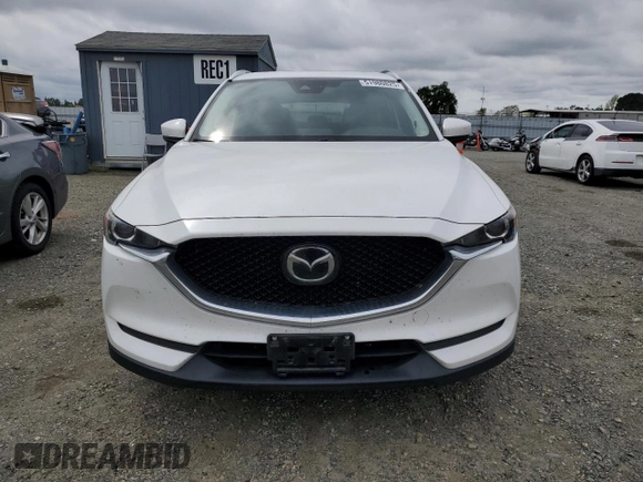 2020 Mazda CX-5 Touring with VIN JM3KFACM0L0857278, listed as a Copart auction lot 51980825 with 73,411 mi miles and Salvage Title. Bid and sale history available at carsss.com. Image 5.