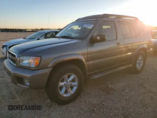 2003 Nissan Pathfinder LE z VIN JN8DR09Y03W813778, wystawiony jako Copart lot #81704494 z przebiegiem 127 986 mil mil oraz Czysty tytuł • Clean title. Historia ofert i sprzedaży dostępna na DreamBid. Obrazek 1.