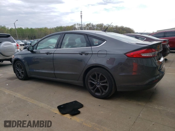 2018 Ford Fusion SE z VIN 3FA6P0HD8JR245391, wystawiony jako Copart lot #53571445 z przebiegiem 158 138 mil mil oraz Czysty tytuł • Clean title. Historia ofert i sprzedaży dostępna na DreamBid. Obrazek 2.