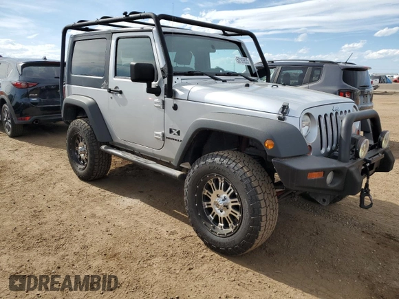 2009 Jeep Wrangler X with VIN 1J4FA24199L787574, listed as a Copart auction lot 58189835 with 74,331 mi miles and Salvage title. Bid and sale history available at DreamBid. Image 4.