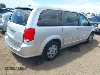2012 Dodge Grand Caravan SE with VIN 2C4RDGBGXCR360045, listed as a IAAI auction lot 42068008 with 146,907 mi miles and . Bid and sale history available at DreamBid. Image 4.