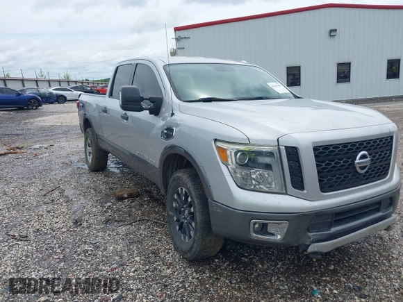 2017 Nissan Titan Pro-4X z VIN 1N6BA1F45HN529090, wystawiony jako IAAI lot #42163486 z przebiegiem 162 226 mil mil oraz . Historia ofert i sprzedaży dostępna na DreamBid. Obrazek 1.