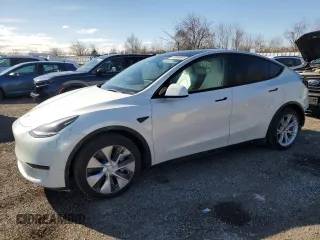 2023 Tesla Model Y Long Range z VIN 7SAYGAEE2PF758235, wystawiony jako Copart lot #49059895 z przebiegiem 57 615 mil mil oraz Czysty tytuł • Clean title. Historia ofert i sprzedaży dostępna na DreamBid. Obrazek 1.