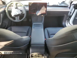 2023 Tesla Model 3 with VIN 5YJ3E1EA8PF548135, listed as a Copart auction lot 88732625 with 33,232 mi miles and Salvage Title. Bid and sale history available at DreamBid. Image 8.