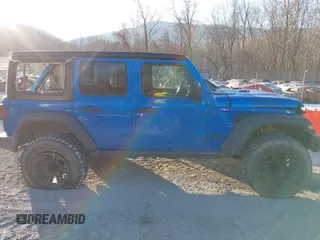 2021 Jeep Wrangler Unlimited Sport S with VIN 1C4HJXDN4MW779291, listed as a IAAI auction lot 41290109 with 43,379 mi miles and . Bid and sale history available at DreamBid. Image 13.