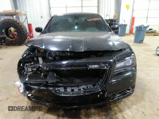 2014 Chrysler 300 S with VIN 2C3CCABG2EH343503, listed as a IAAI auction lot 40934463 with 128,876 mi miles and . Bid and sale history available at carsss.com. Image 12.