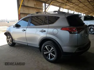 2018 Toyota RAV4 XLE with VIN JTMRFREV1JJ213808, listed as a Copart auction lot 54437805 with 56,972 mi miles and Salvage Title. Bid and sale history available at DreamBid. Image 2.