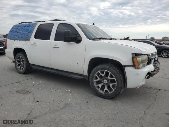 2012 Chevrolet Suburban LT with VIN 1GNSCJE08CR251841, listed as a Copart auction lot 83227314 with 0 mi miles and Salvage Title. Bid and sale history available at carsss.com. Image 4.