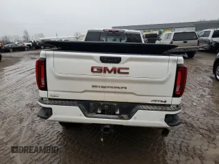 2023 GMC Sierra 3500HD AT4 z VIN 1GT49VEY7PF154909, wystawiony jako Copart lot #84681084 z przebiegiem Nie podano mil oraz Szkoda całkowita • Salvage title. Historia ofert i sprzedaży dostępna na DreamBid. Obrazek 6.