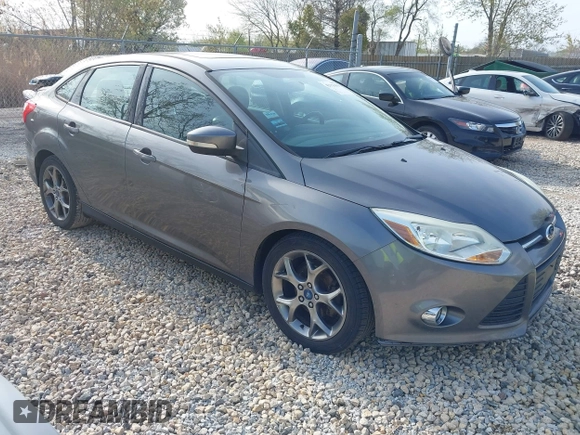 2013 Ford Focus SE with VIN 1FADP3F22DL117712, listed as a IAAI auction lot 42131439 with 124,327 mi miles. Bid and sale history available at carsss.com. Image 1.