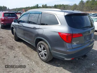2017 Honda Pilot EX-L with VIN 5FNYF6H5XHB009029, listed as a IAAI auction lot 41883366 with 95,711 mi miles and . Bid and sale history available at DreamBid. Image 3.