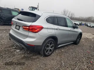 2018 BMW X1 xDrive28i with VIN WBXHT3C36J5F90135, listed as a Copart auction lot 43766955 with 76,530 mi miles and Salvage Title. Bid and sale history available at carsss.com. Image 3.