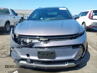 2025 Chevrolet Equinox EV LT z VIN 3GN7DLRP6SS145485, wystawiony jako IAAI lot #42014380 z przebiegiem 912 mil mil oraz . Historia ofert i sprzedaży dostępna na DreamBid. Obrazek 13.