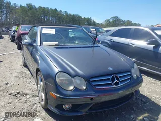 2009 Mercedes-Benz CLK-Class 3.5L with VIN WDBTK56FX9T108975, listed as a IAAI auction lot 41884199 with 121,764 mi miles. Bid and sale history available at carsss.com. Image 1.