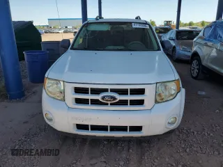 2009 Ford Escape Hybrid z VIN 1FMCU59329KB62379, wystawiony jako Copart lot #67153395 z przebiegiem 110 881 mil mil oraz Czysty tytuł • Clean title. Historia ofert i sprzedaży dostępna na DreamBid. Obrazek 5.