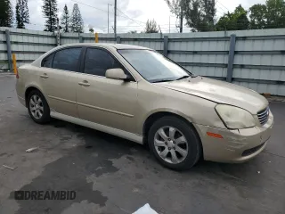2008 Kia Optima LX z VIN KNAGE124385198719, wystawiony jako Copart lot #55449255 z przebiegiem 156 972 mil mil oraz Szkoda całkowita • Salvage title. Historia ofert i sprzedaży dostępna na DreamBid. Obrazek 4.