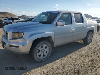 2007 Honda Ridgeline RTL w/Leather with VIN 2HJYK165X7H500660, listed as a Copart auction lot 69111204 with 206,943 mi miles and Salvage Title. Bid and sale history available at carsss.com. Image 1.