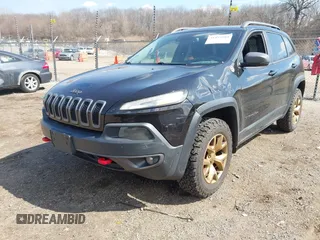 2014 Jeep Cherokee Trailhawk with VIN 1C4PJMBS6EW100500, listed as a IAAI auction lot 41894989 with 131,034 mi miles. Bid and sale history available at carsss.com. Image 17.