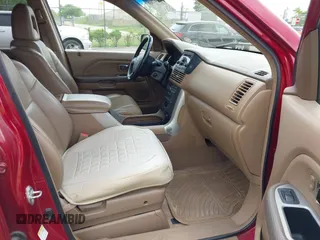 2005 Honda Pilot EX-L z VIN 5FNYF18525B054075, wystawiony jako IAAI lot #42347365 z przebiegiem 124 911 mil mil oraz . Historia ofert i sprzedaży dostępna na DreamBid. Obrazek 5.