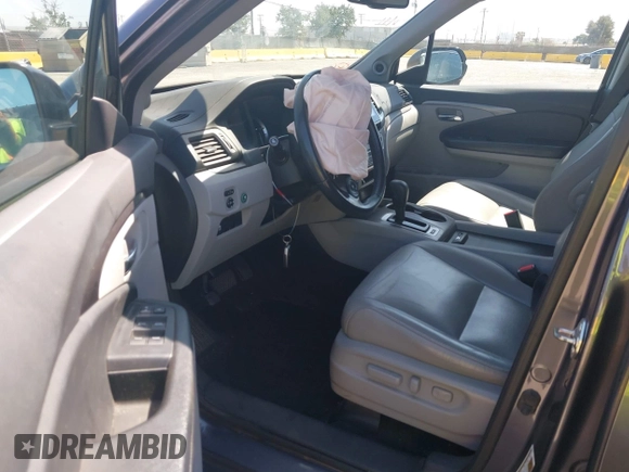 2017 Honda Pilot EX-L with VIN 5FNYF6H59HB032480, listed as a IAAI auction lot 42488789 with 112,595 mi miles and . Bid and sale history available at DreamBid. Image 5.