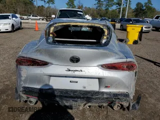 2021 Toyota GR Supra 2.0 with VIN WZ1DB2C00MW037881, listed as a Copart auction lot 86379904 with 0 mi miles and Salvage Title. Bid and sale history available at carsss.com. Image 6.