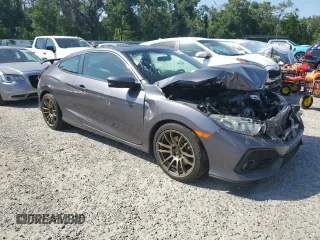 2017 Honda Civic Si with VIN 2HGFC3A56HH752212, listed as a Copart auction lot 52446995 with 134,218 mi miles and Salvage Title. Bid and sale history available at DreamBid. Image 4.