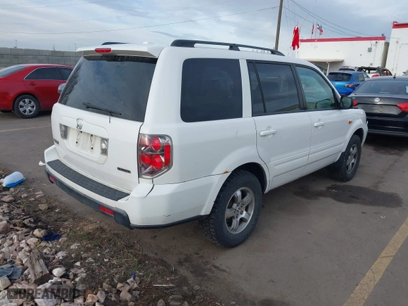 2006 Honda Pilot EX-L with VIN 2HKYF18576H517590, listed as a IAAI auction lot 41802601 with 233,833 mi miles. Bid and sale history available at carsss.com. Image 4.